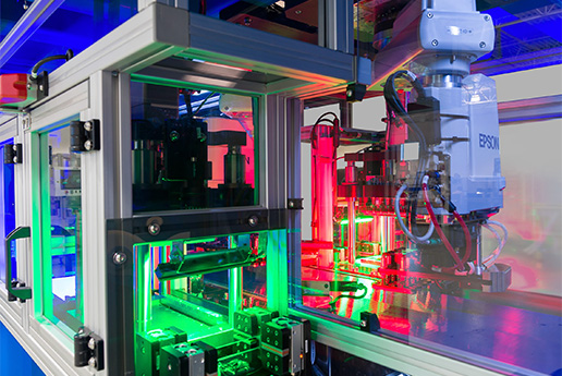 Robotic assembly cell for life science devices